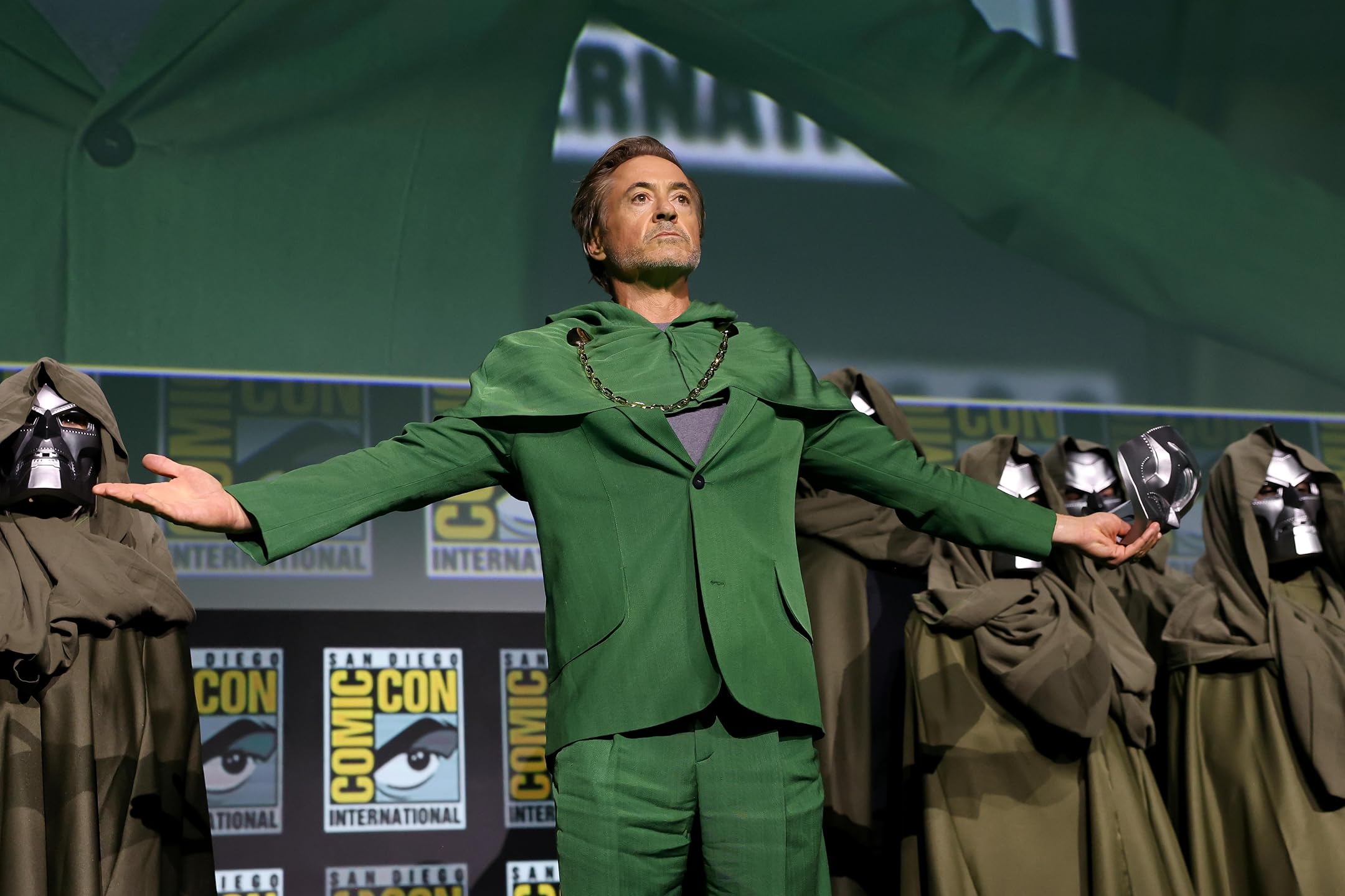 Robert Downey Jr. appears on stage at San Diego Comic-Con in a Doctor Doom costume during the Avengers: Doomsday panel, thrilling Marvel fans with a dramatic reveal.