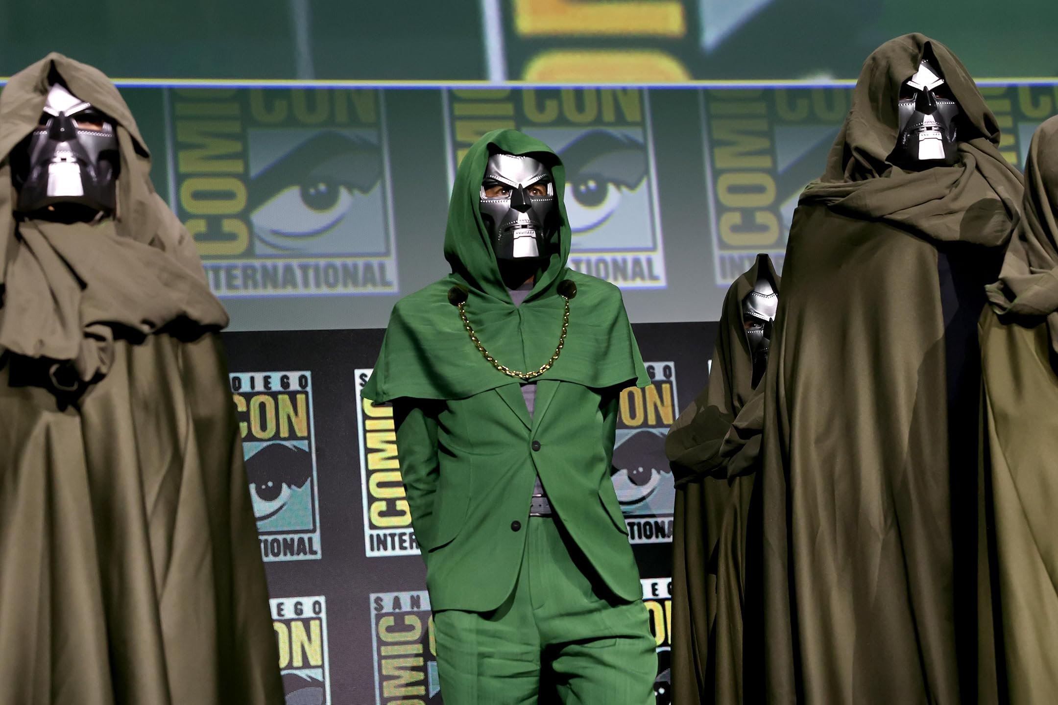 Robert Downey Jr. appears on stage at San Diego Comic-Con in a Doctor Doom costume during the Avengers: Doomsday panel, thrilling Marvel fans with a dramatic reveal.