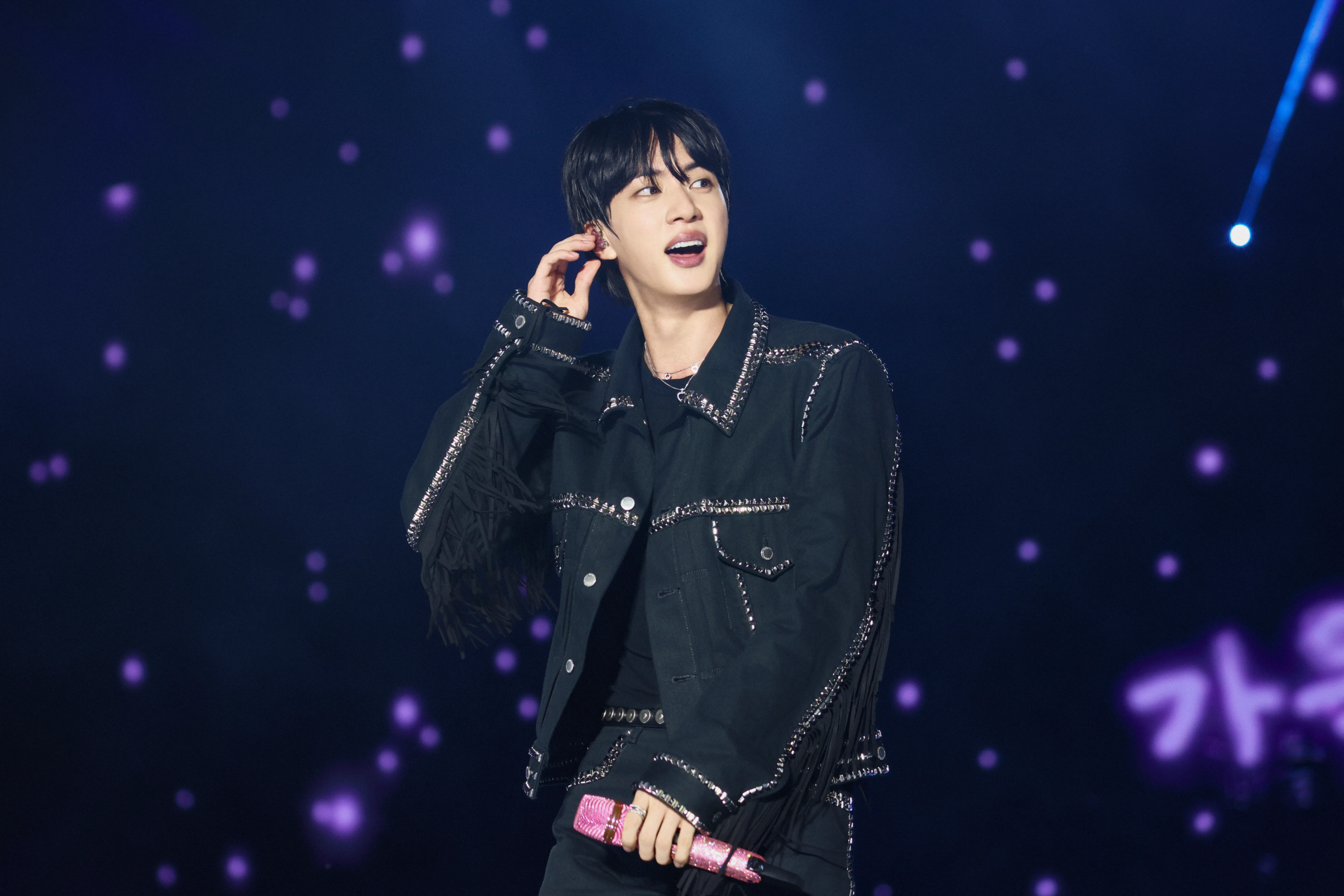 BTS' Kim Seok Jin on stage, hearing the crowd