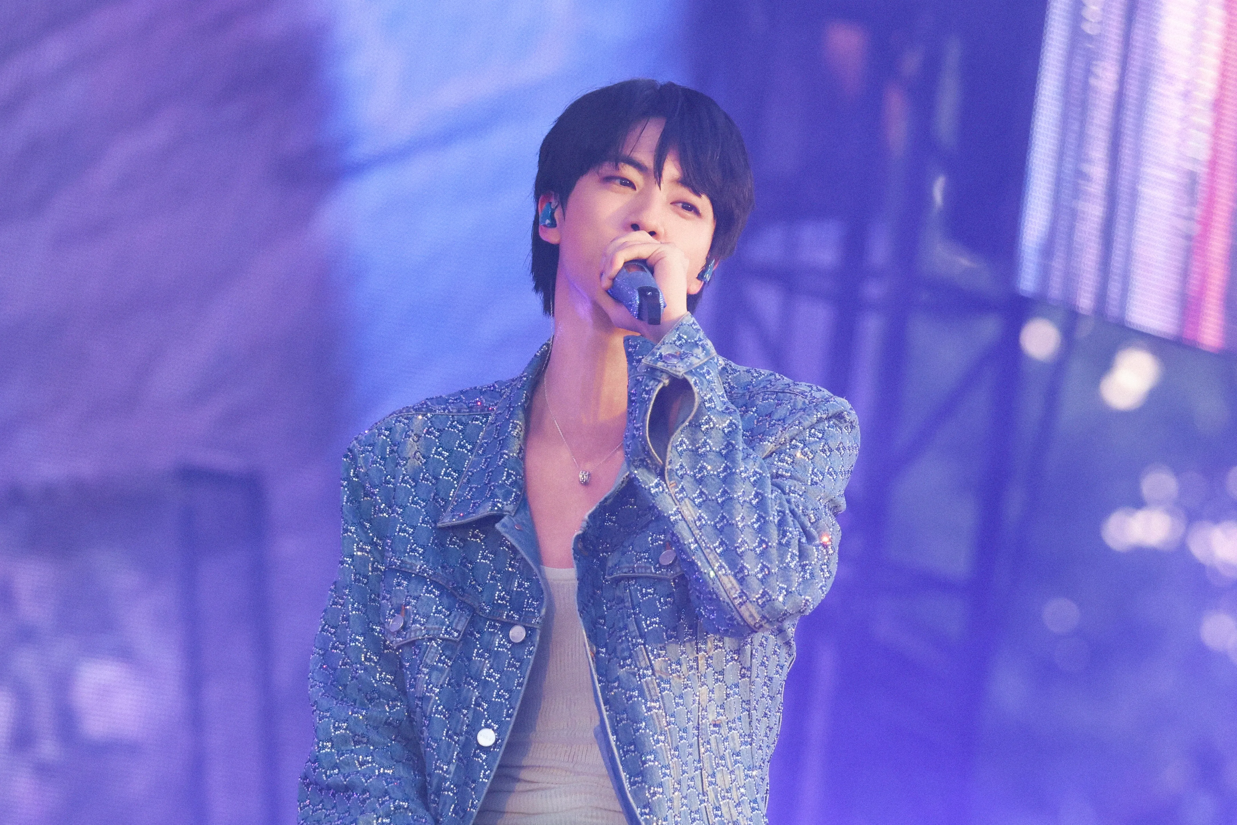 BTS' Kim Seok Jin singing on stage